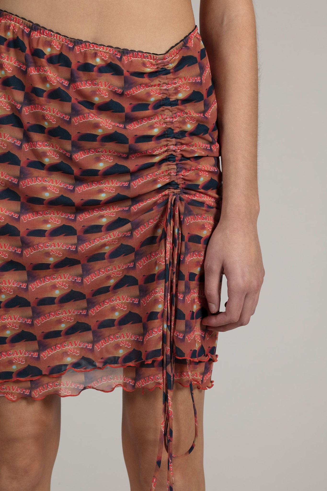 Sunset Tits Mesh Double Layer Mini Skirt